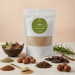 Prakriki Sattva Keshya Ayurvedic herbal Shampoo powder product packaging with ingredients on a wooden surface