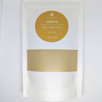 Ayurvedic Ubtan natural powder refill pouch.
Prakriti Sattva Ayurvedic Ubtan Powder. A jar of orange-hued powder, perfect for natural face and body cleansing and scrubbing. The label features Ayurvedic herb powders like mung bean flour, besan / chickpea flour, rice flour, neem, licorice, rose, indicating the natural ingredients used.