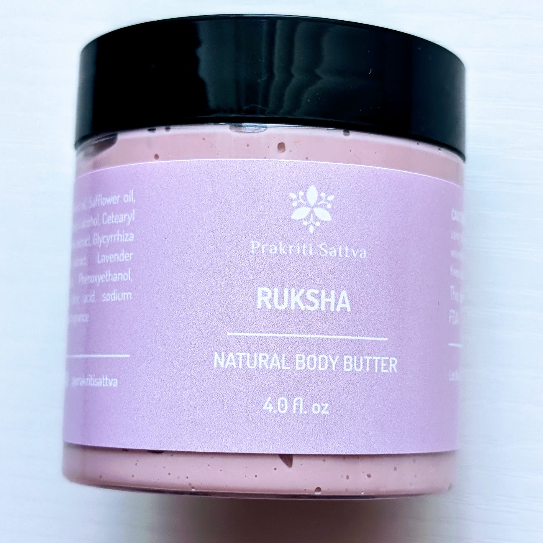 Prakriti Sattva 4-ounce pink body butter in a plastic jar with black lid. The jar is filled with a creamy, textured, pink body butter product