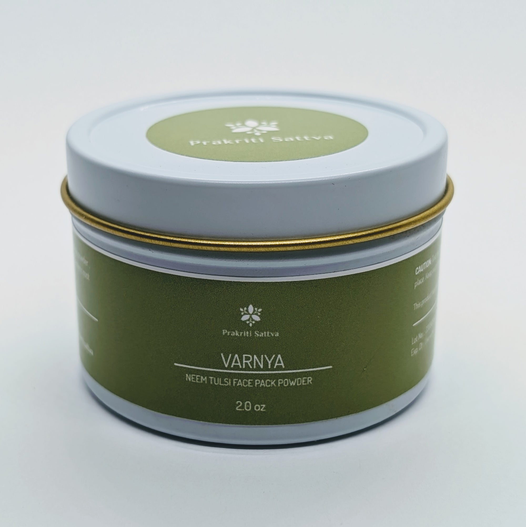 A closed 2 ounce aluminum jar of Prakriti Sattva Neem Tulsi Moringa Amla Face Pack for Acne-Prone and Kapha-Pitta Skin. A natural, Ayurvedic face mask to help reduce acne, balance oil production, and soothe inflammation.